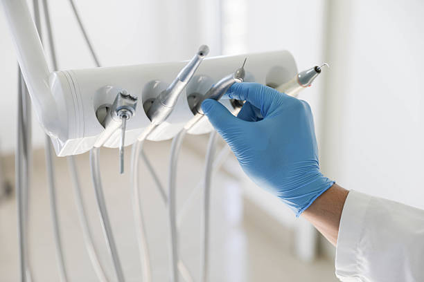 Professional Teeth Cleaning And Checkup technician working in Garden City, NY